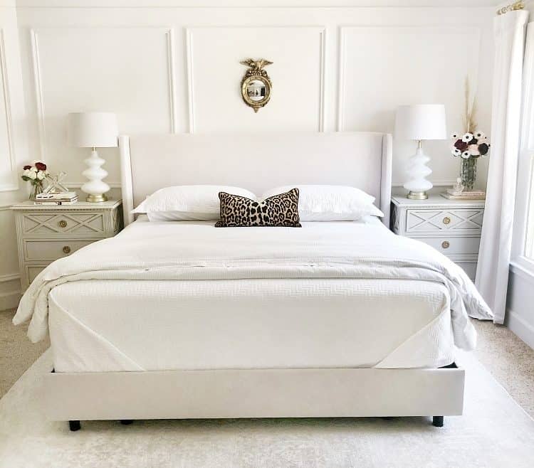 A photo of a white bedroom