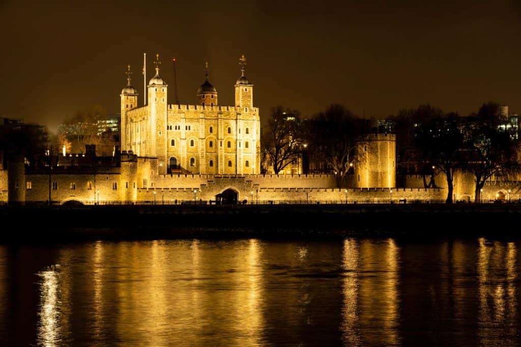 A photo of the Tower Hill and theTower of London at night